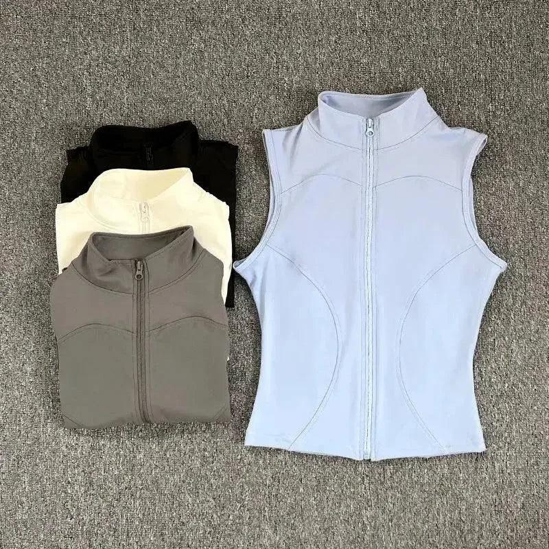 Women's sleeveless zip-up athletic vest in white, black, cream, gray — stylish fitness wear for active lifestyles