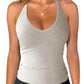 Women's gray ribbed tank top with V-neck, ideal for casual or workout wear, paired with black leggings.