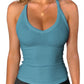 Teal ribbed women's tank top with V-neck and halter straps, stylish fitness wear