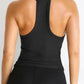 Black ribbed racerback tank top for women, stylish fitness wear with open back design