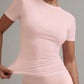 Pink women's fitted short sleeve top with ruched detail, fashion activewear