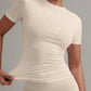 Cream ribbed short sleeve top for women, stretchy fitted fashion tee with ruched detail