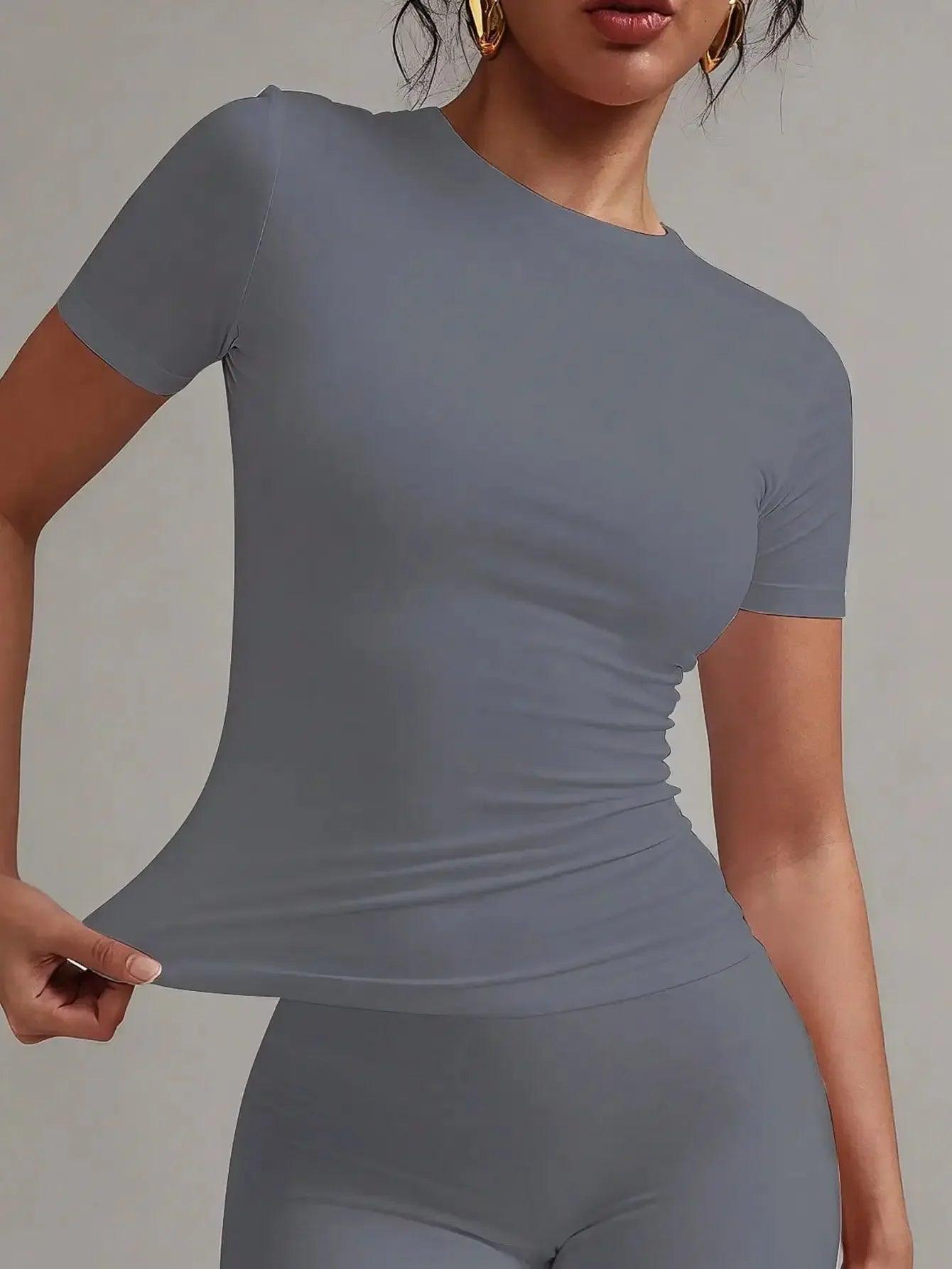 Gray women's fitted short sleeve top with ruched side detail, fashion activewear