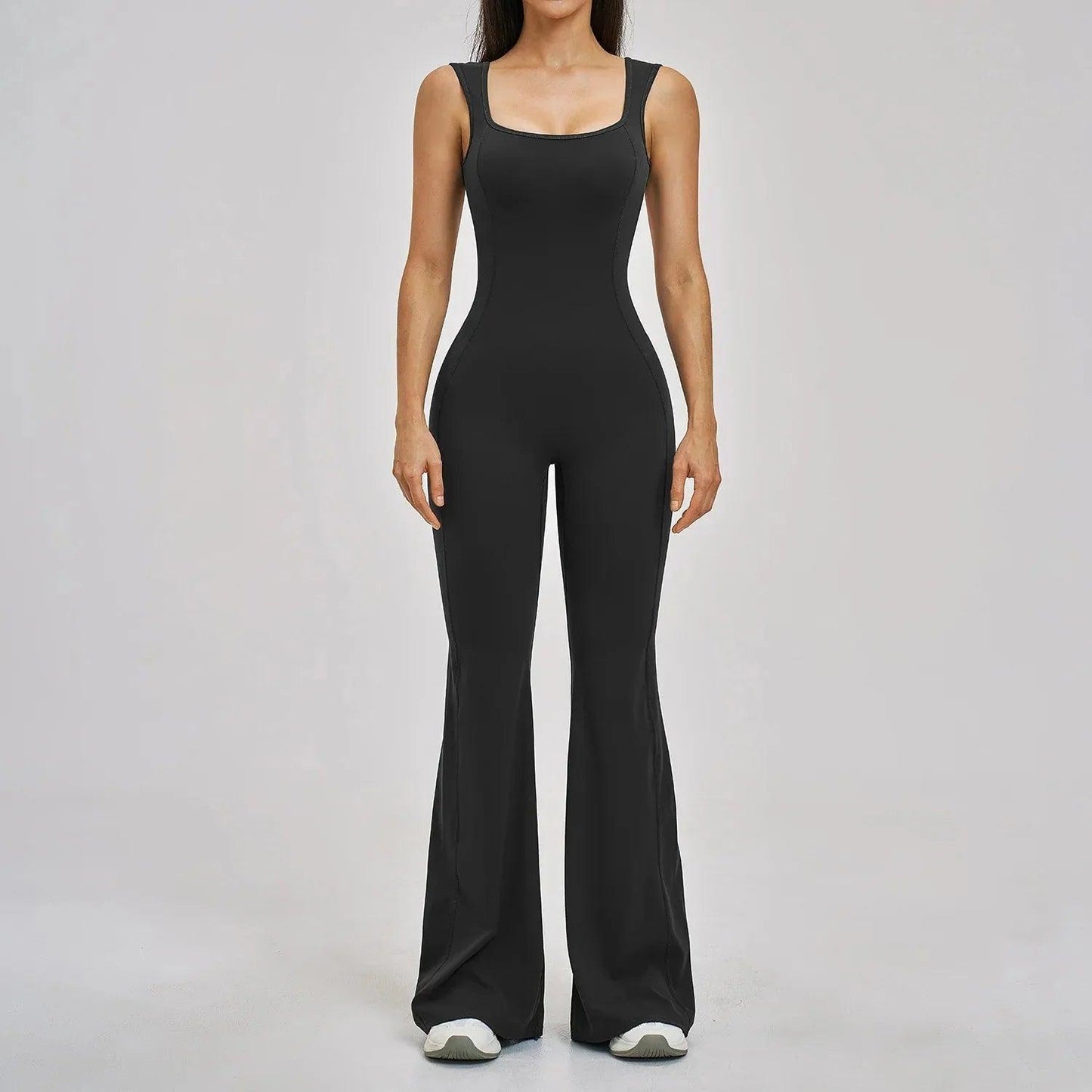 Black women's sleeveless jumpsuit with flared legs, stylish fashion outfit