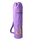 Purple yoga mat bag with gold Om symbol, drawstring closure, and front zipper pocket for gym or studio use
