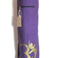 Purple yoga mat bag with gold Om symbol, ideal for women's fitness and wellness routines.