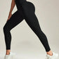 Black high-waisted leggings with ribbed texture, paired with white sneakers, ideal for women's fashion and fitness wear