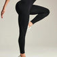 Black high-waist workout leggings with stretchy fabric, paired with white sneakers for gym or yoga