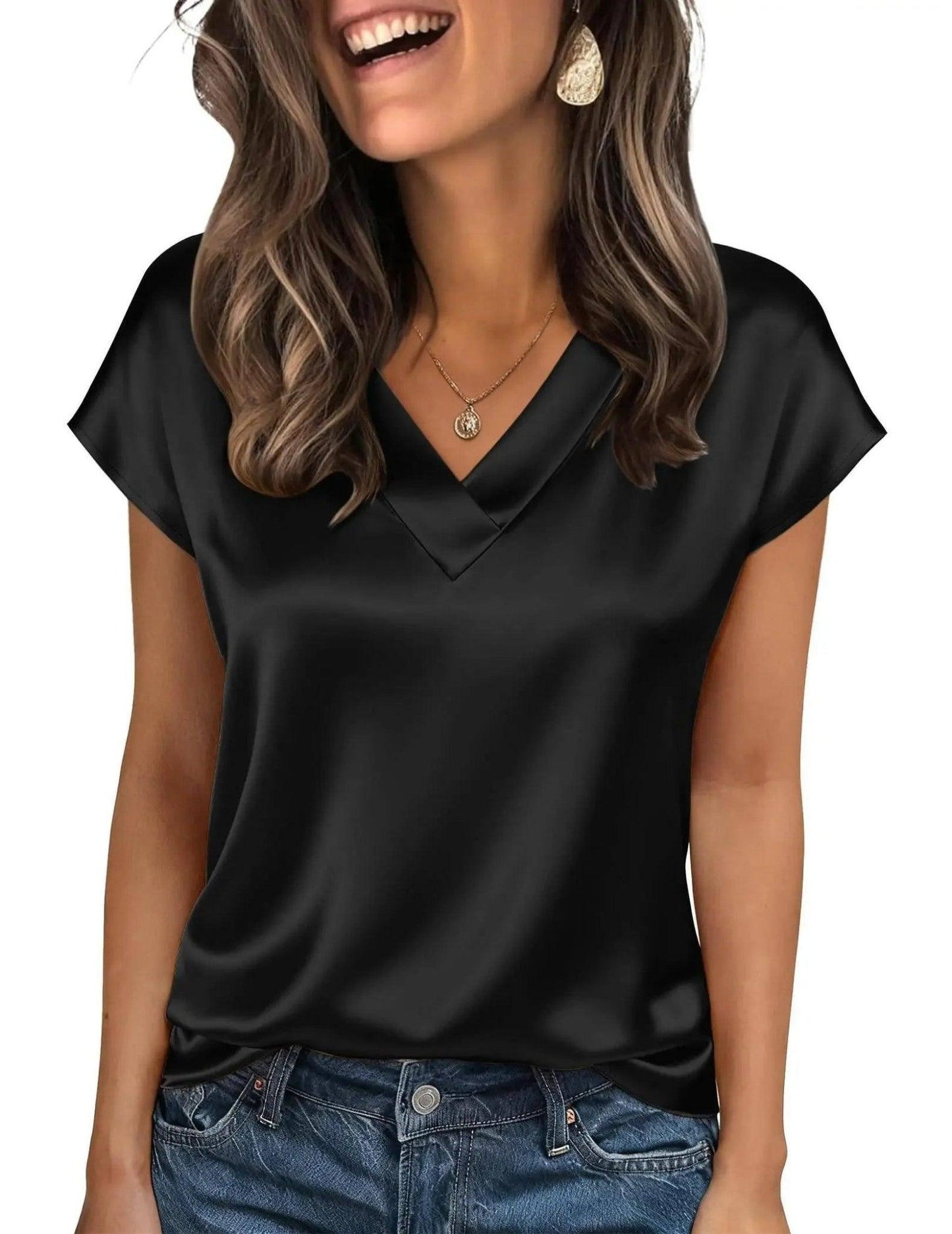 Black satin V-neck women's top with short sleeves, paired with jeans and gold jewelry for casual fashion