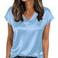 Light blue satin V-neck women's fashion top with short sleeves, styled with jeans and gold jewelry