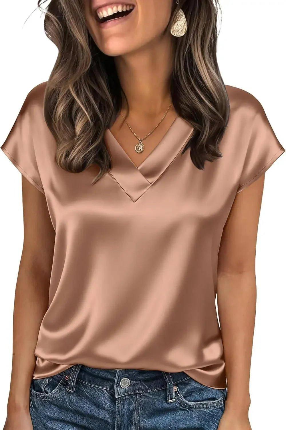 Women's satin V-neck blouse with short sleeves, paired with jeans for casual fashion