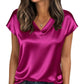 Women's shiny magenta satin V-neck top with short sleeves, paired with jeans for casual fashion