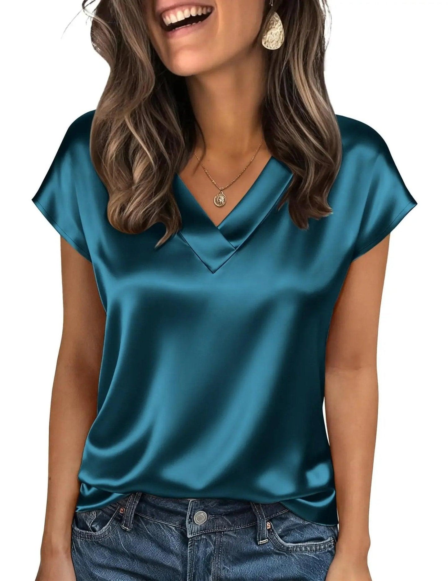 Teal satin V-neck women's blouse with short sleeves, paired with jeans for casual fashion