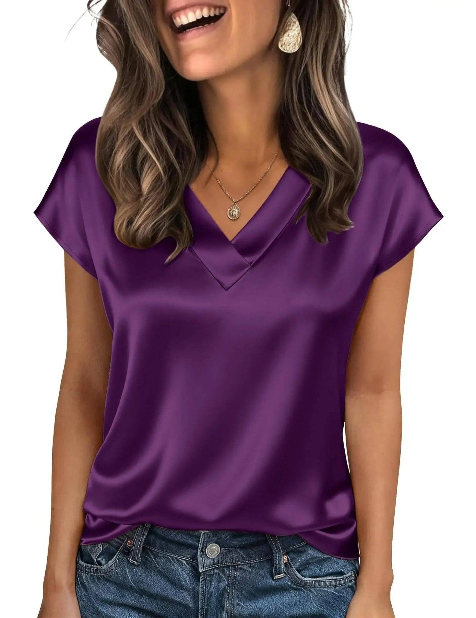 Purple satin V-neck women's top with short sleeves, styled with jeans and gold jewelry for casual fashion