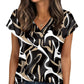 Women's black and beige abstract print V-neck short sleeve top with denim jeans