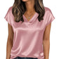 Pink satin V-neck women's top with short sleeves, paired with jeans for casual fashion