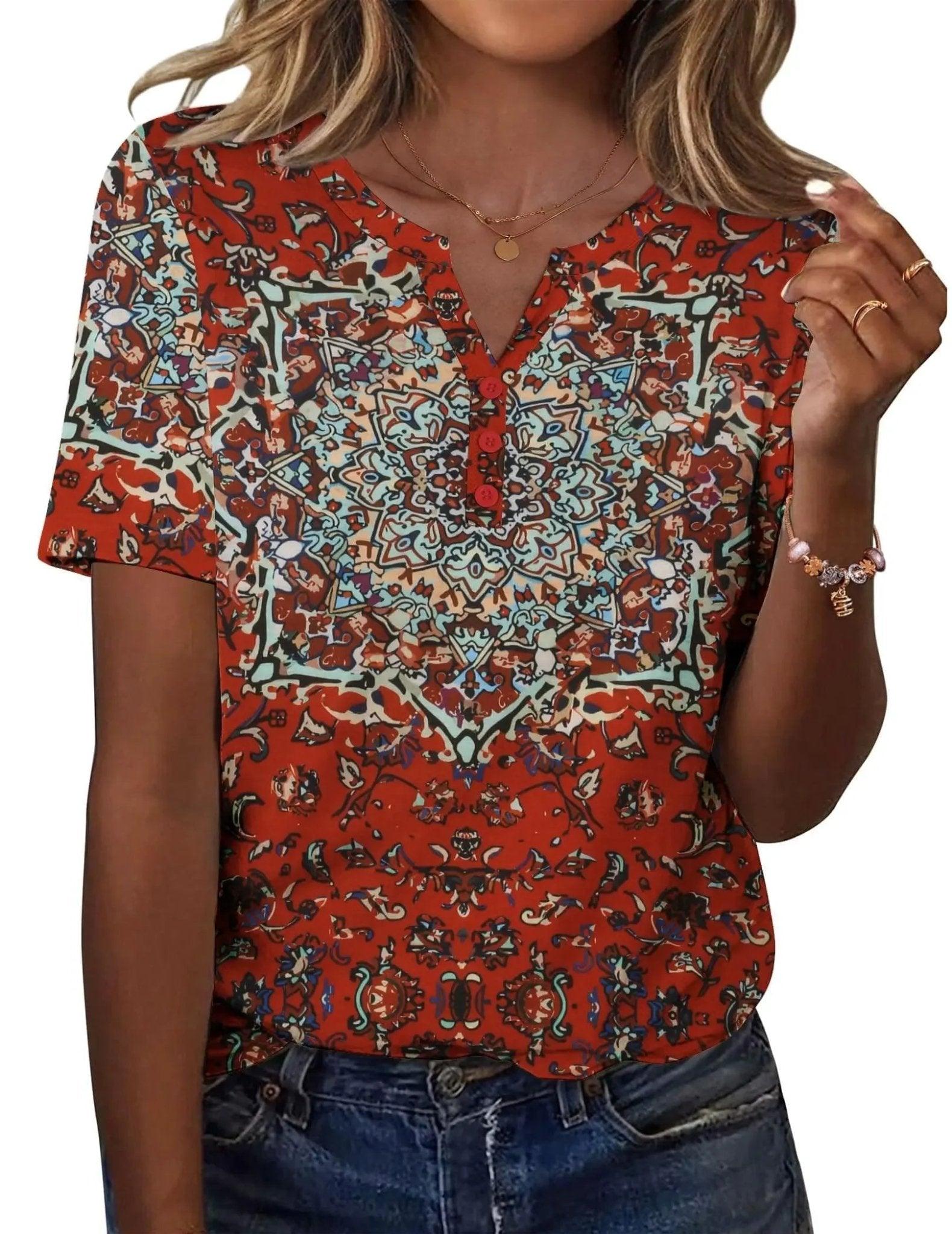 Woman wearing red patterned V-neck short sleeve blouse with buttons, paired with jeans for casual fashion
