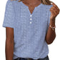 Blue and white striped women's V-neck button-up top with short sleeves, paired with denim jeans