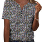 Women's floral print V-neck button-up top with short sleeves, paired with denim jeans for casual fashion