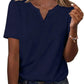 Navy blue women's V-neck button-up t-shirt with short sleeves, paired with jeans and gold jewelry