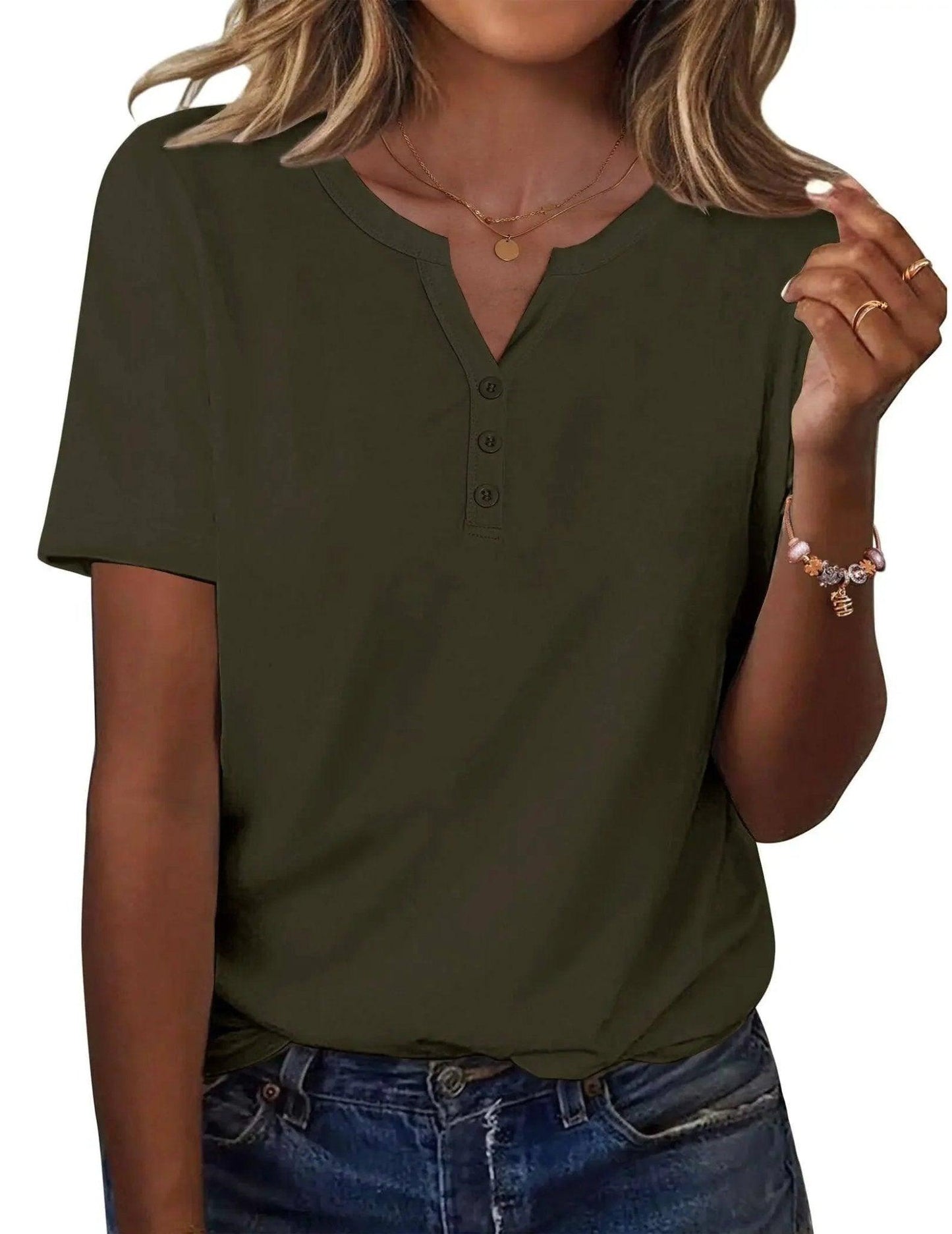 Olive green women's V-neck button-up t-shirt with short sleeves, paired with denim jeans and layered necklaces.