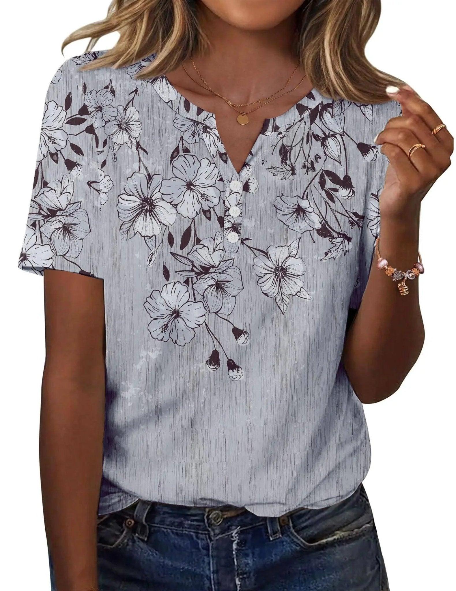 Women's floral print V-neck blouse with short sleeves, button front, and casual summer style