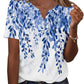 Blue floral print women's V-neck short sleeve top with button detail, casual fashion blouse